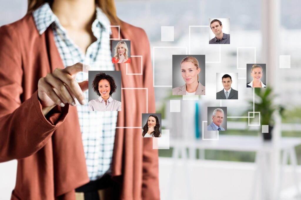 Illustration of staff augmentation model showing internal team collaborating with external professionals in a hybrid work environment